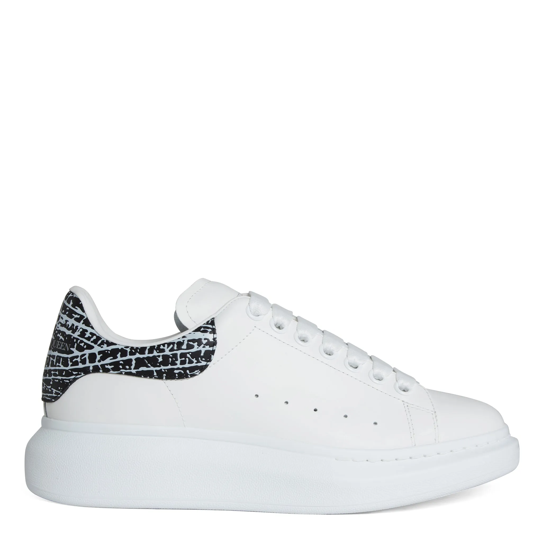 ALEXANDER MCQUEEN  Sneakers oversize in pelle bianca e nera